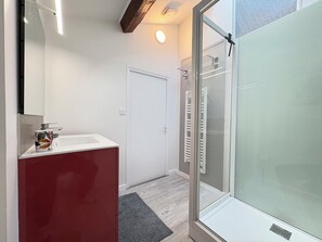 Shower, free toiletries, hair dryer, toilet paper