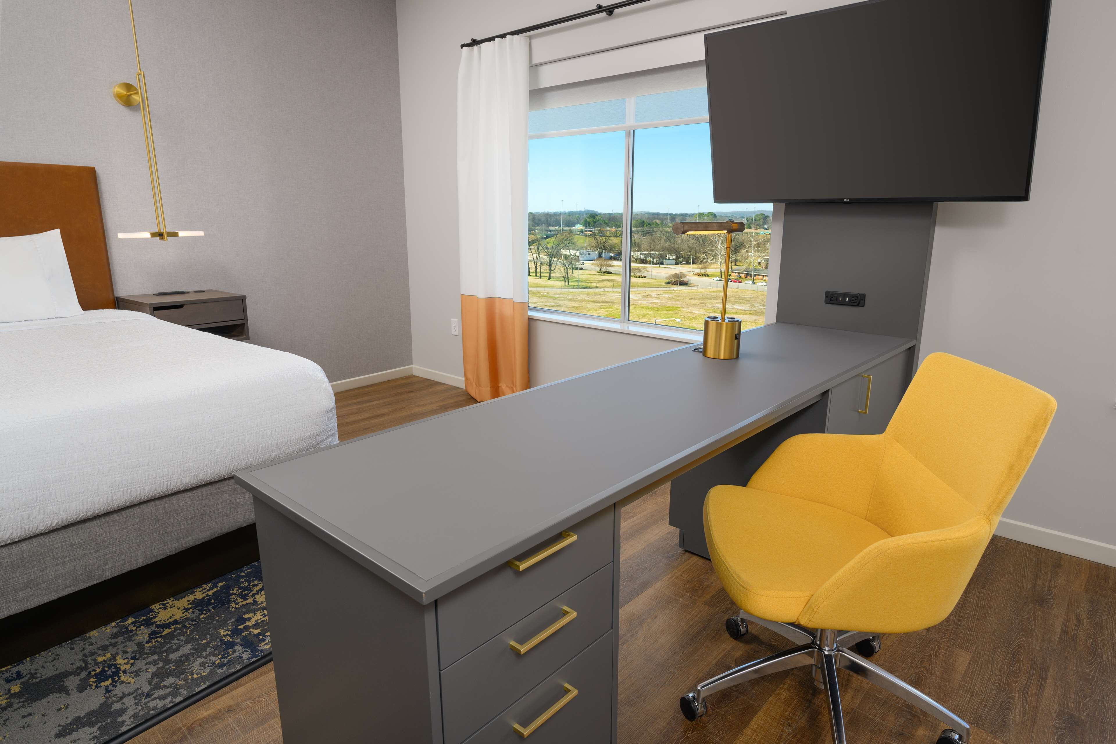 desk, laptop workspace, blackout curtains, iron/ironing board