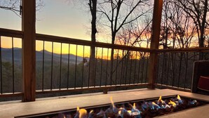 A fire feature with a view of mountains and trees. - Stunning Views over Aska +Hot Tub & Firepit +Arcade and Pool table +Near Toccoa (Blue Ridge)