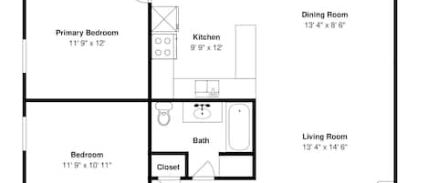 A floor plan with a primary bedroom, kitchen, dining room, living room, and a fireplace.