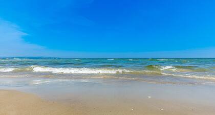 Lütt Mia | Modern. Generous. Directly by the sea.