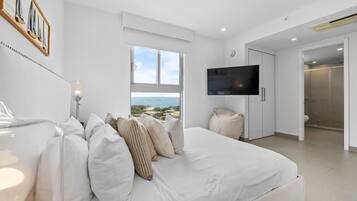 3 dormitorios, tabla de planchar con plancha, cuna de viaje