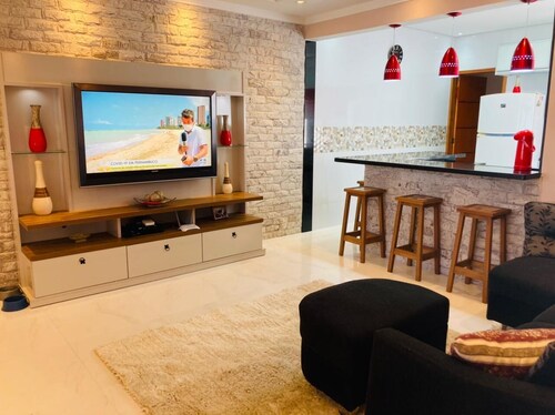 Modern and cozy house with fireplace and heated pool just 50m from the beach