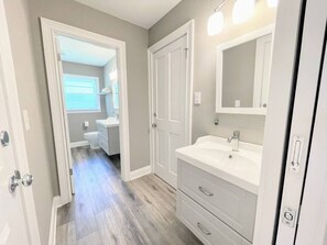 Hair dryer, towels, soap, toilet paper