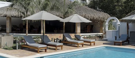 Outdoor pool, open 8:00 AM to 10:00 PM, sun loungers