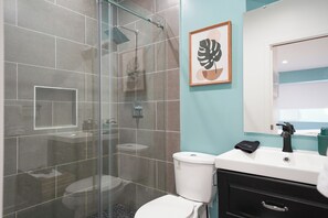 Shower, hair dryer, towels, soap