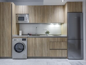 Fridge, microwave, coffee/tea maker, toaster