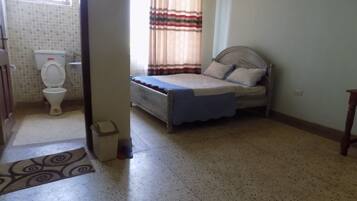 1 habitación y ropa de cama