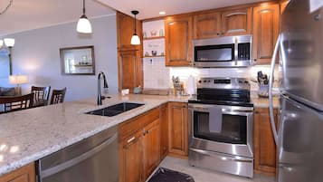 Coffee/tea maker, fridge, microwave, oven
