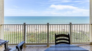 A balcony with a view of the beach and ocean. - Cinnamon Beach 8 by Distinctive Beach Rentals (Palm Coast)