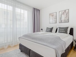 One-bedroom Suite with balcony & courtyard view | Individually decorated, free WiFi, bed sheets