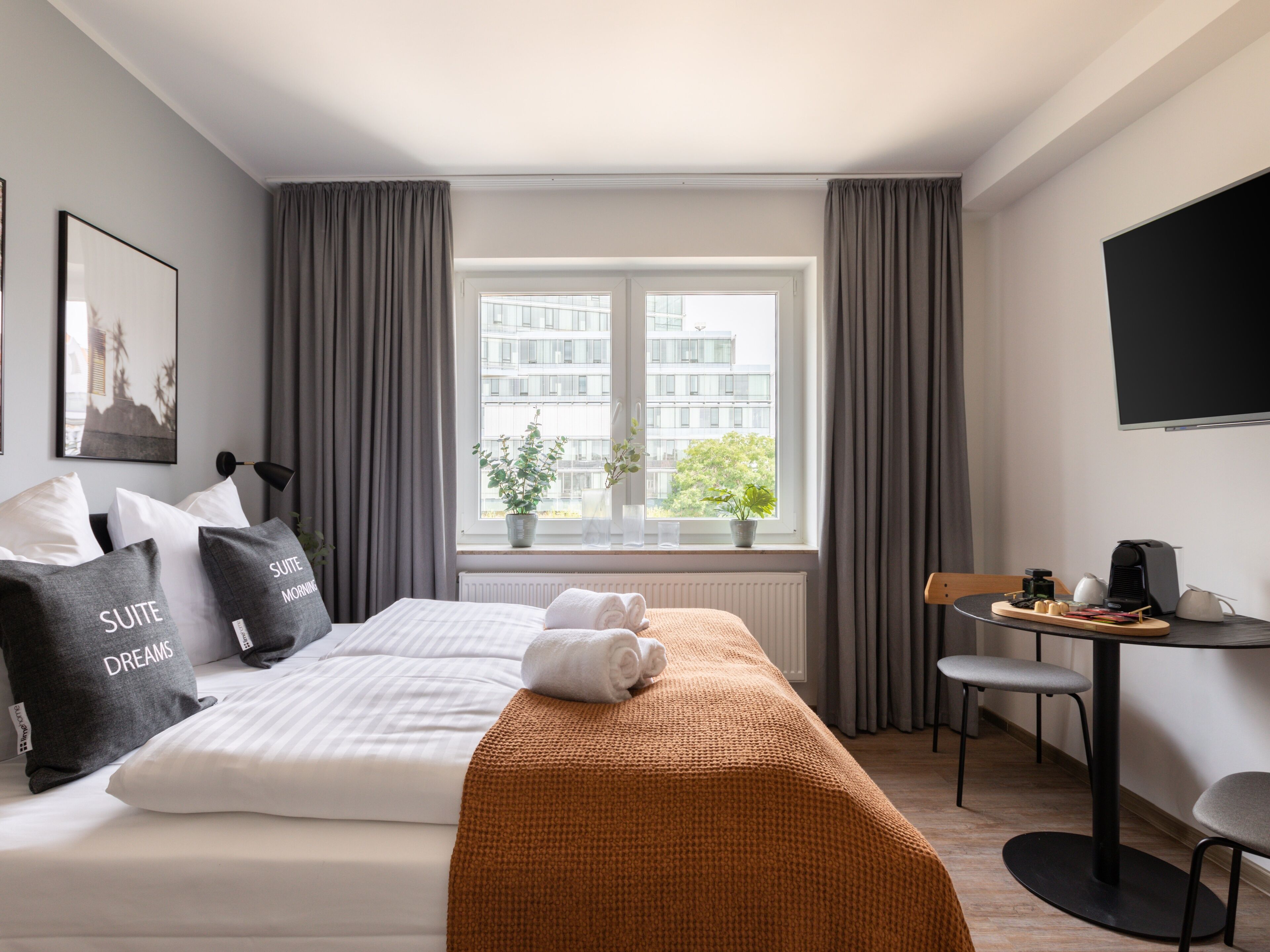 Desk, laptop workspace, free WiFi, bed sheets