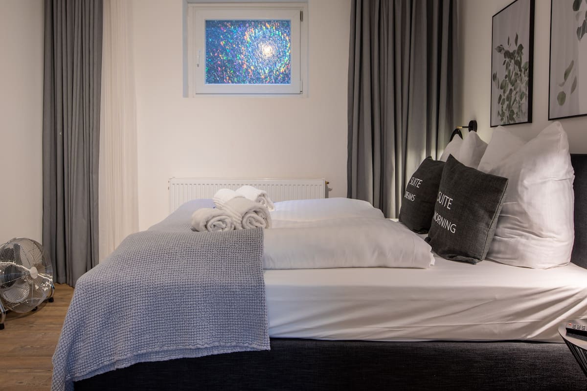 One-Bedroom Suite (basement) | 1 bedroom, desk, laptop workspace, free WiFi
