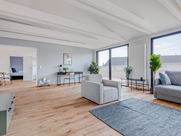 Two-Bedroom Penthouse Suite with rooftop terrace | Living area | TV