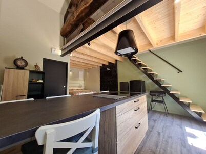 Cozy Studio with Mezzanine, Private Courtyard, Wifi, Near Owners' Home in Renovated Barn