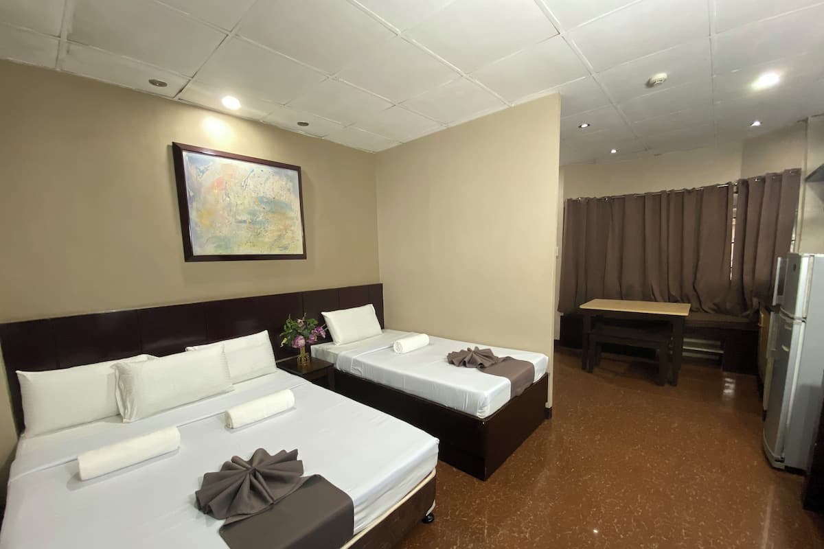 Deluxe Triple Room, 1 Bedroom | 1 bedroom, desk, laptop workspace, free WiFi
