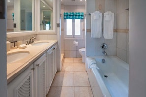 Bathtub, hair dryer, towels