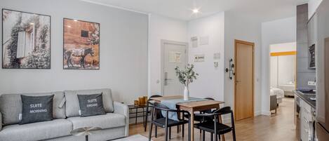 Apartment, 1 Queen Bed with Sofa bed (limehome Madrid Ramón | Studio disabi) | Living area | 50-inch Smart TV with satellite channels, TV