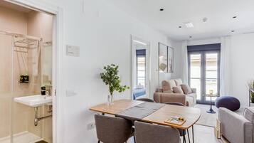 Apartment, 1 Bedroom (L) | Living area | Smart TV