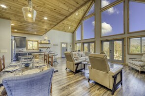 Spacious Livingroom - Ceiling to floor windows for enjoying the mountain views.