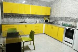 Fridge, microwave, dining tables