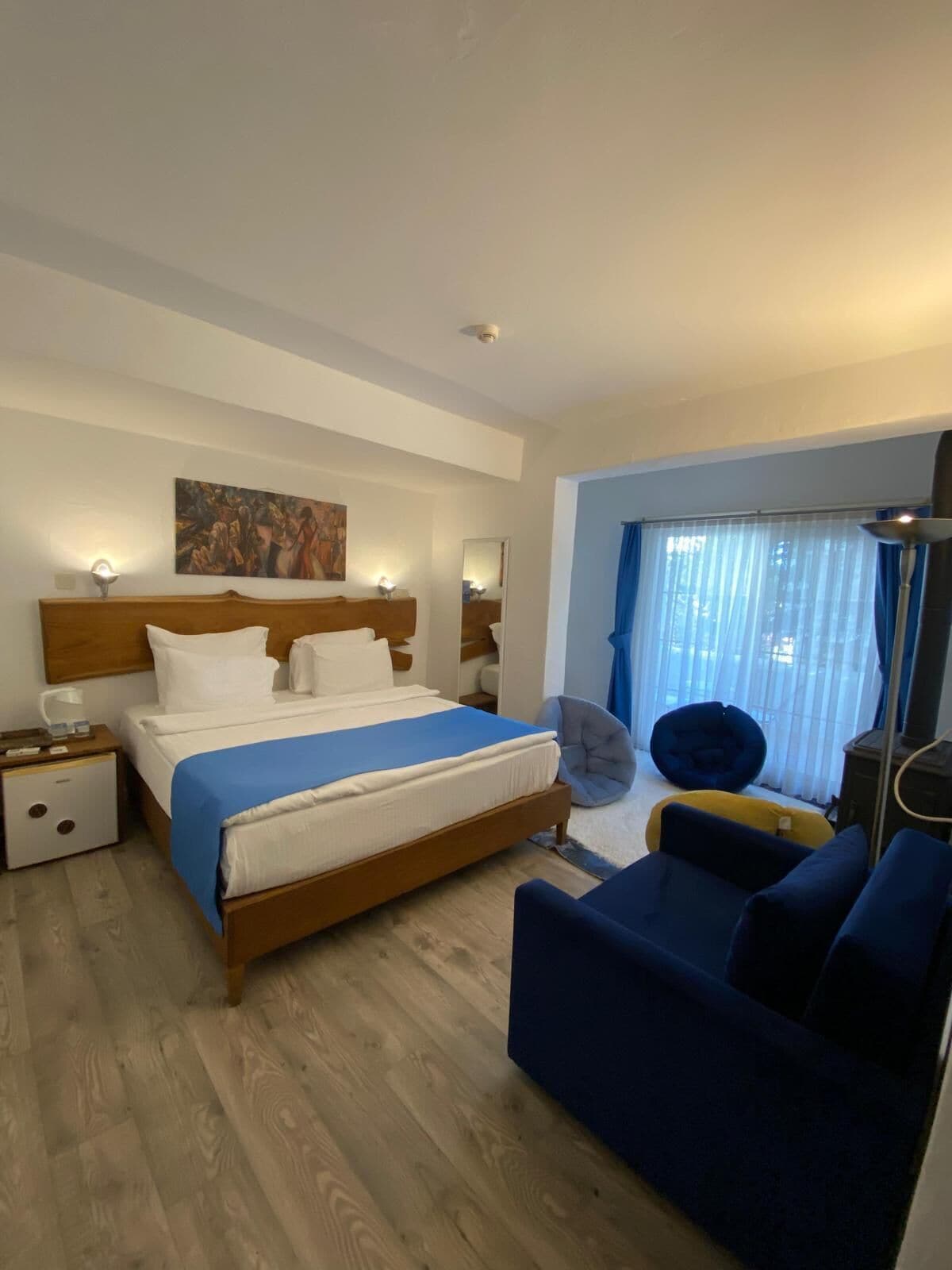 family quadruple room, fireplace | 1 bedroom, premium bedding, minibar, desk