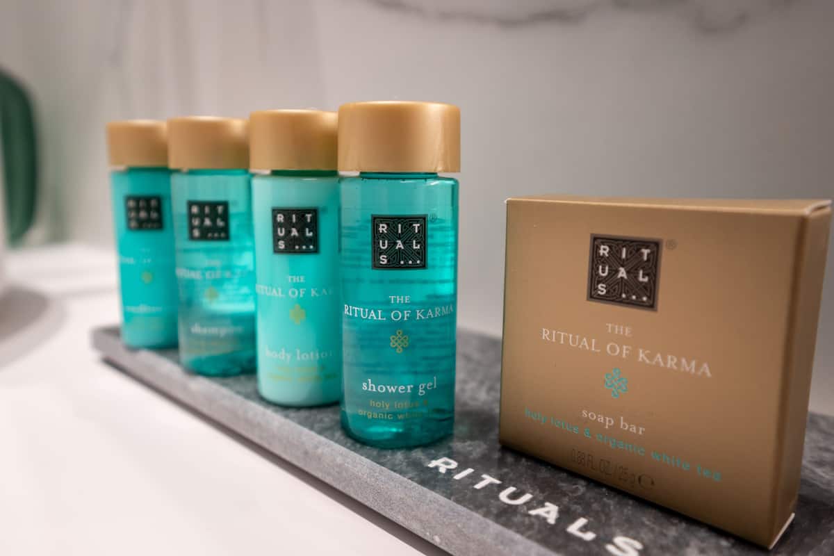 shower, rainfall showerhead, slippers, towels