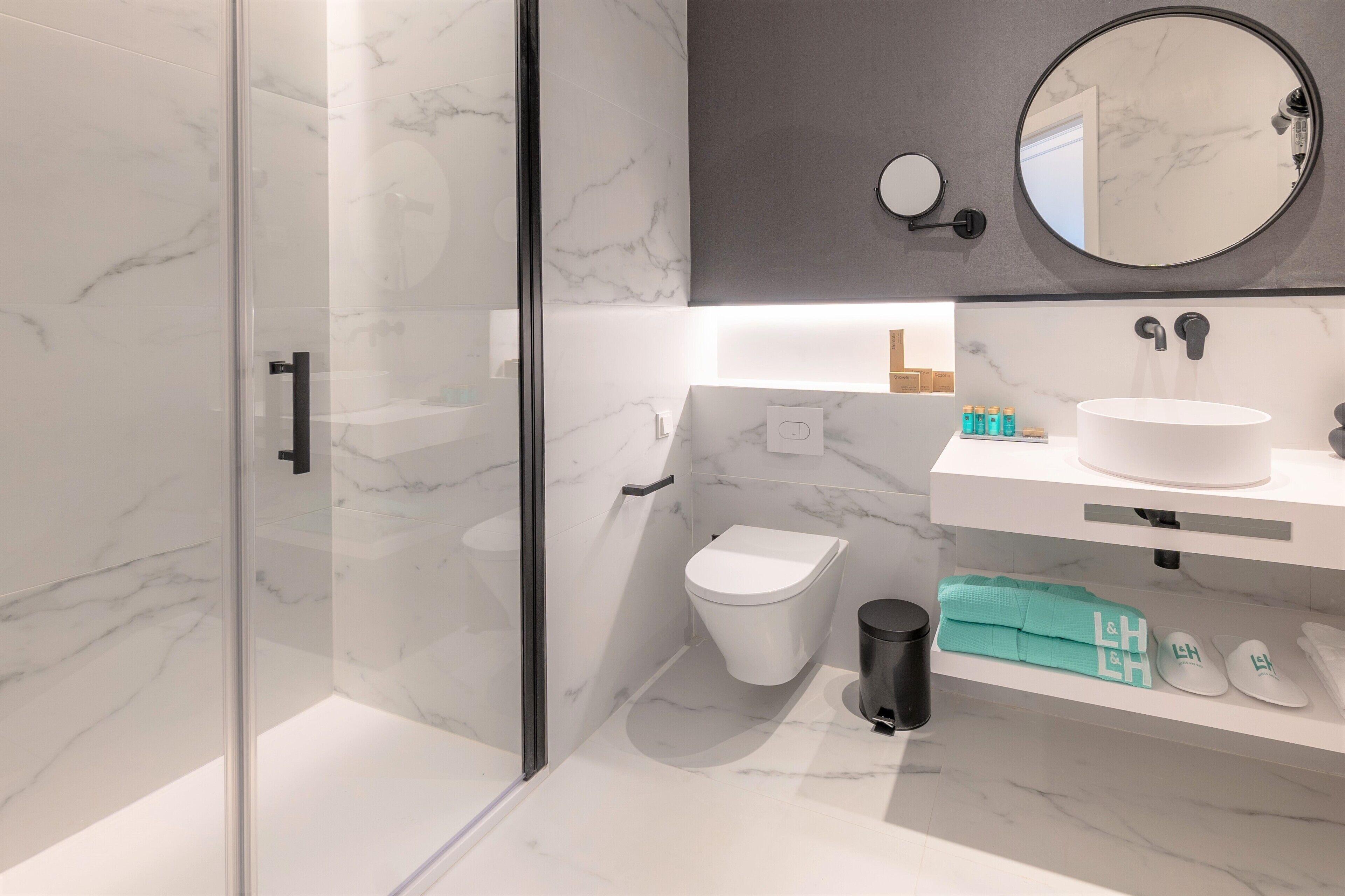 shower, rainfall showerhead, slippers, towels