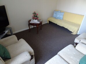 Apartment, Mehrere Betten | Wohnzimmer