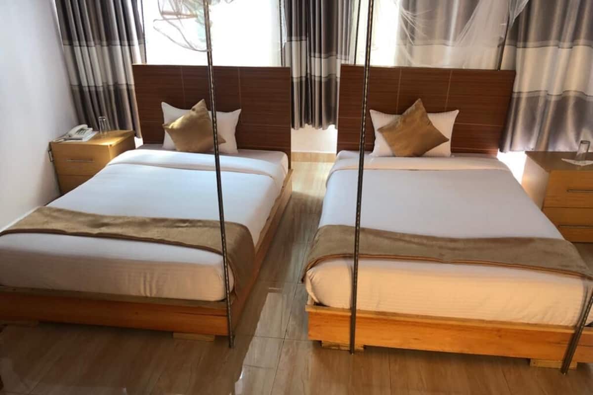 Chambre Standard avec lits jumeaux | Bureau, Wi-Fi gratuit, draps fournis