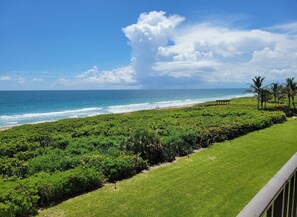 On the beach, sun loungers, beach towels - Oceanfront 4th Floor NE Corner Unit - Spectacular Wrap Around Beach  Views (Fort Pierce)