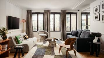 3-BR Prestige Apartment Terrace Eiffel Tower view | Living area | 43-inch LCD TV with digital channels, TV, printers