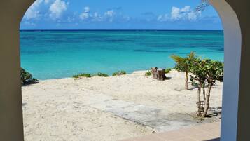 On the beach, sun loungers, beach towels