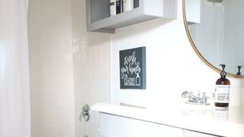 Combined shower/tub, hair dryer