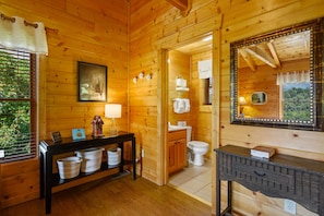 Combined shower/bathtub, towels, toilet paper