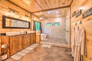 Bathtub, hair dryer, towels, soap