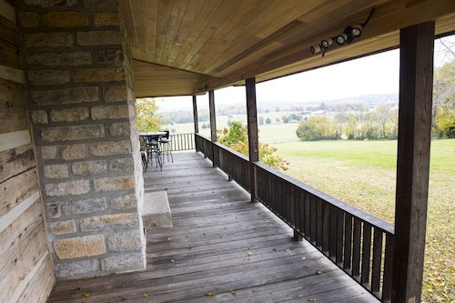 Historic Log Cabin on 200 acre farm, pasture and forest with panoramic views!