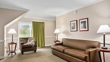 Room, Multiple Beds (SBDSBV) | Living area | 40-inch TV with cable channels