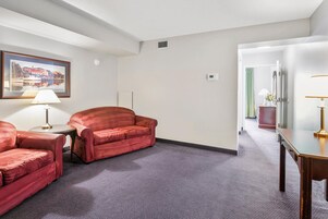 Room, Multiple Beds (SBSSBV) | Living area | 40-inch TV with cable channels