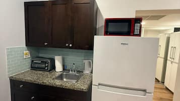 Fridge, microwave, coffee/tea maker, high chair