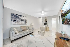 Living room with  Smart TV and Coffee station