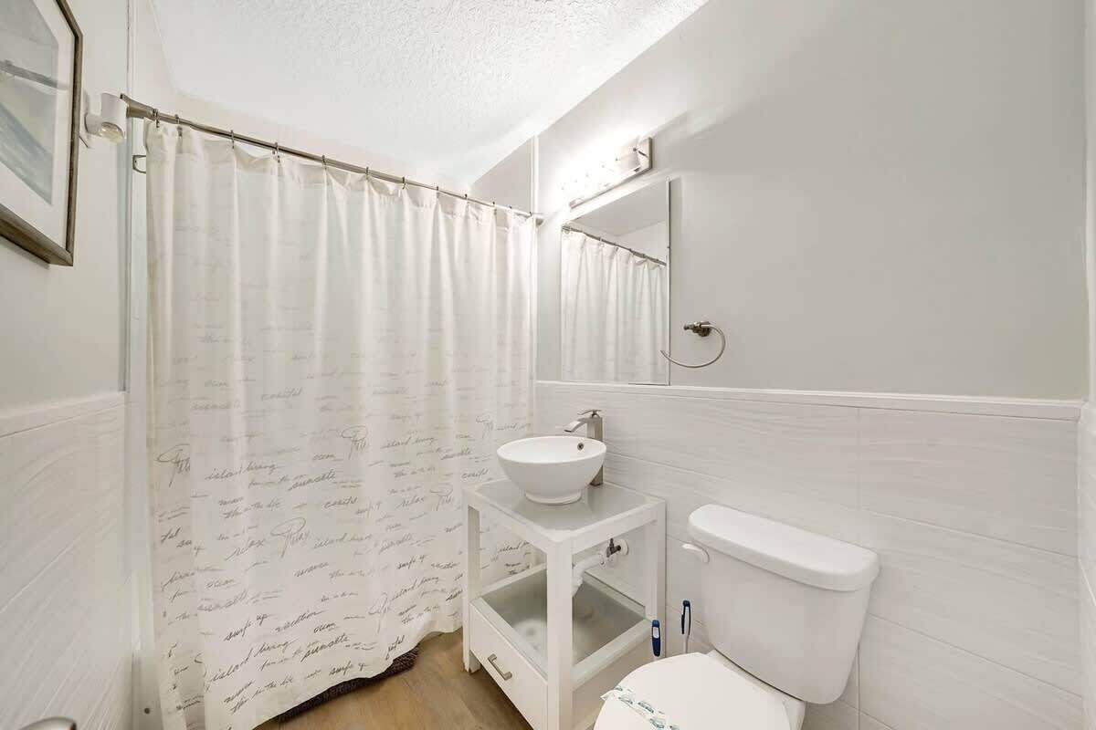 Bathroom with bathtub and shower