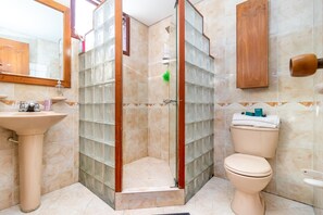 Shower, designer toiletries, towels, soap