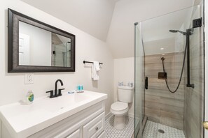 Bathtub, hair dryer, towels