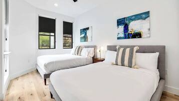 4 bedrooms, desk, iron/ironing board, travel crib
