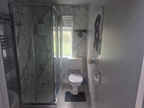 Shower, hair dryer, towels