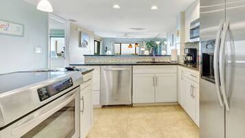 Condo, Multiple Beds, Balcony, Ocean View (#105 - No Pets) | Private kitchen | Fridge, microwave, oven, stovetop
