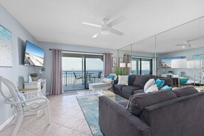Condo (#403 - No Pets) | Living area | 42-inch TV with cable channels - Windjammer by Distinctive Beach Rentals (St. Augustine)