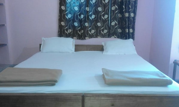 Egyptian cotton sheets, premium bedding, down duvets, memory-foam beds