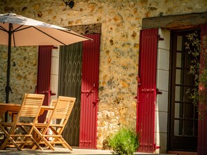 Outdoor dining - Authentic gîte on estate with swimming pool (Issac)